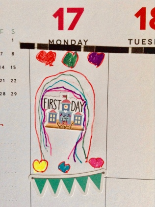 My daughter's planner with the First Day of School. I love the hearts and rainbow.